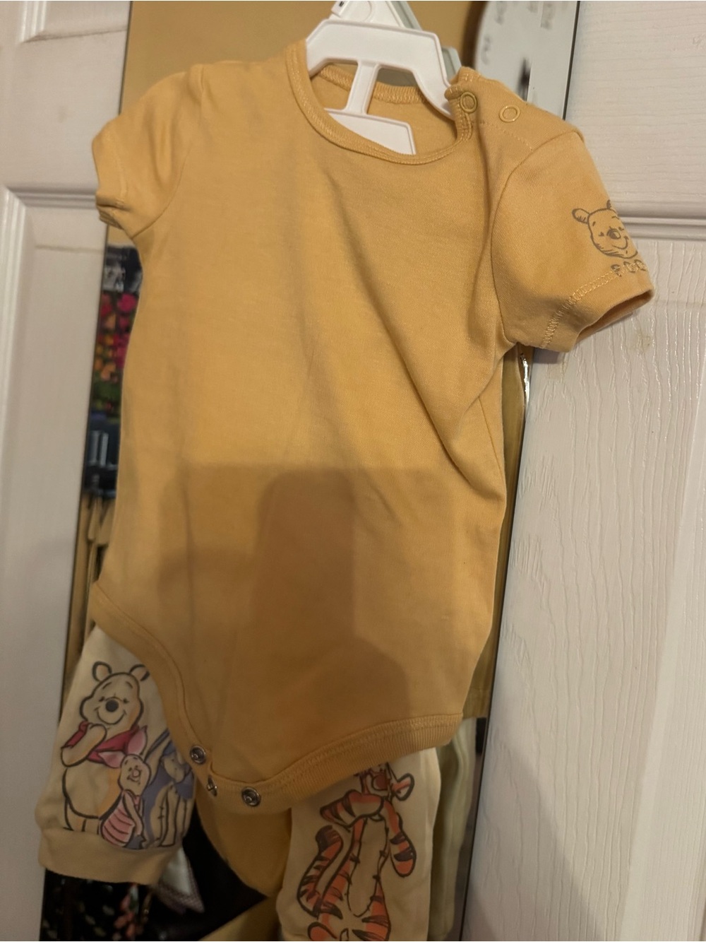 Disney Baby Mustard Yellow Infant Bodysuit with White Logo Print